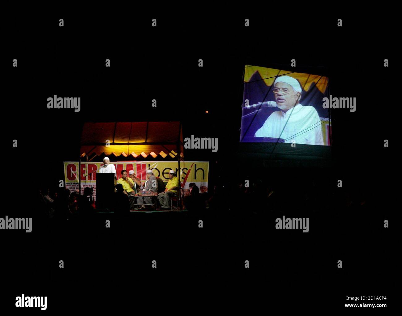 Hadi Awang President Of Malaysia S Opposition Parti Islam Se Malaysia Is Seen On A Big Screen During A Free Election Campaign Rally In Kuala Terengganu In The Opposition Stronghold State Of Terengganu February