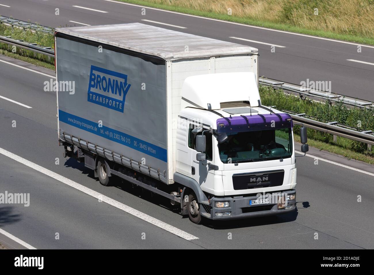 Bronny MAN TGL truck on motorway. Stock Photo