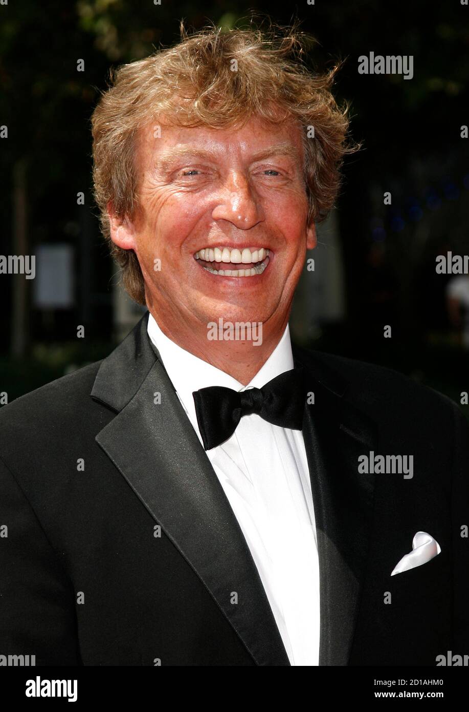Producer Nigel Lythgoe arrives at the Primetime Creative Arts Emmy Awards in Los Angeles, September 12, 2009. REUTERS/Danny Moloshok (UNITED STATES ENTERTAINMENT) Stock Photo