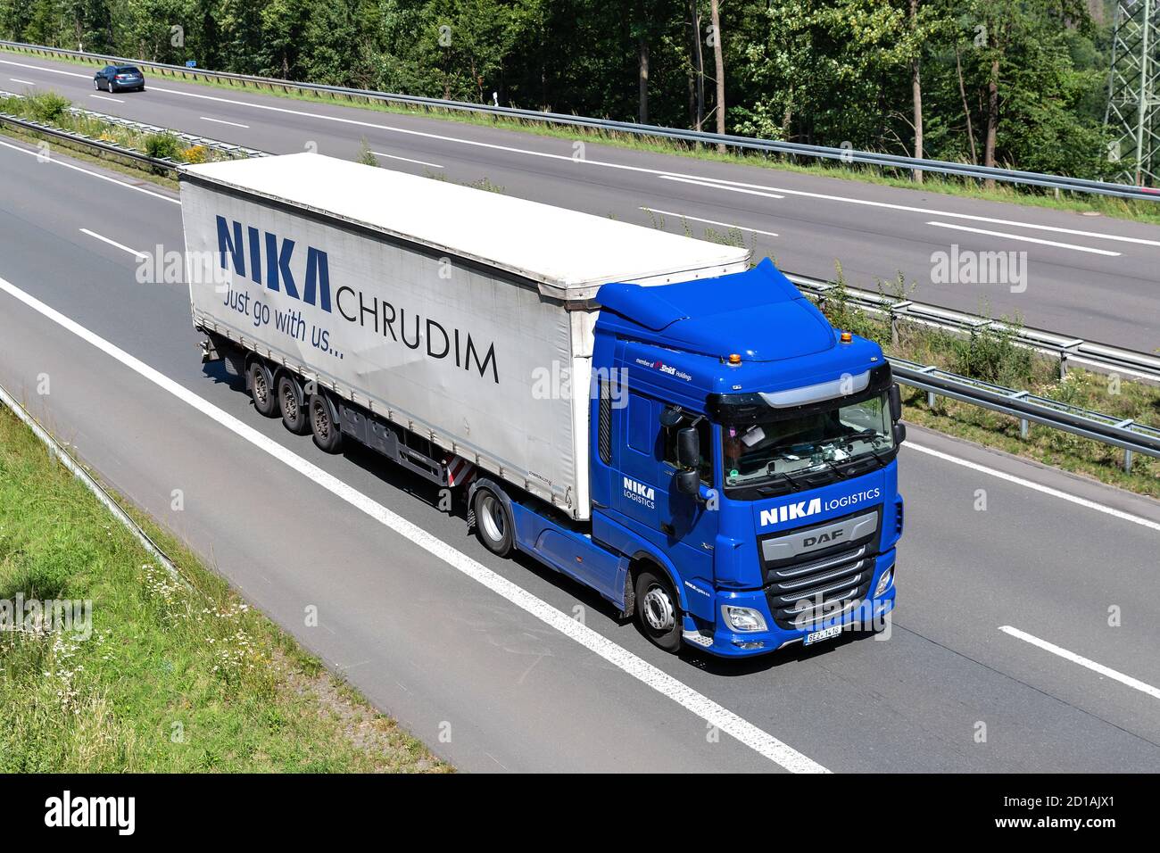 NIKA DAF XF truck with curtainside trailer on motorway Stock Photo - Alamy