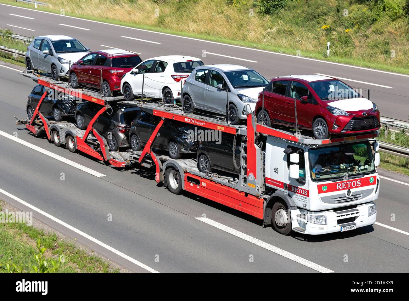 Retos Renault car-carrying truck on motorway. Stock Photo