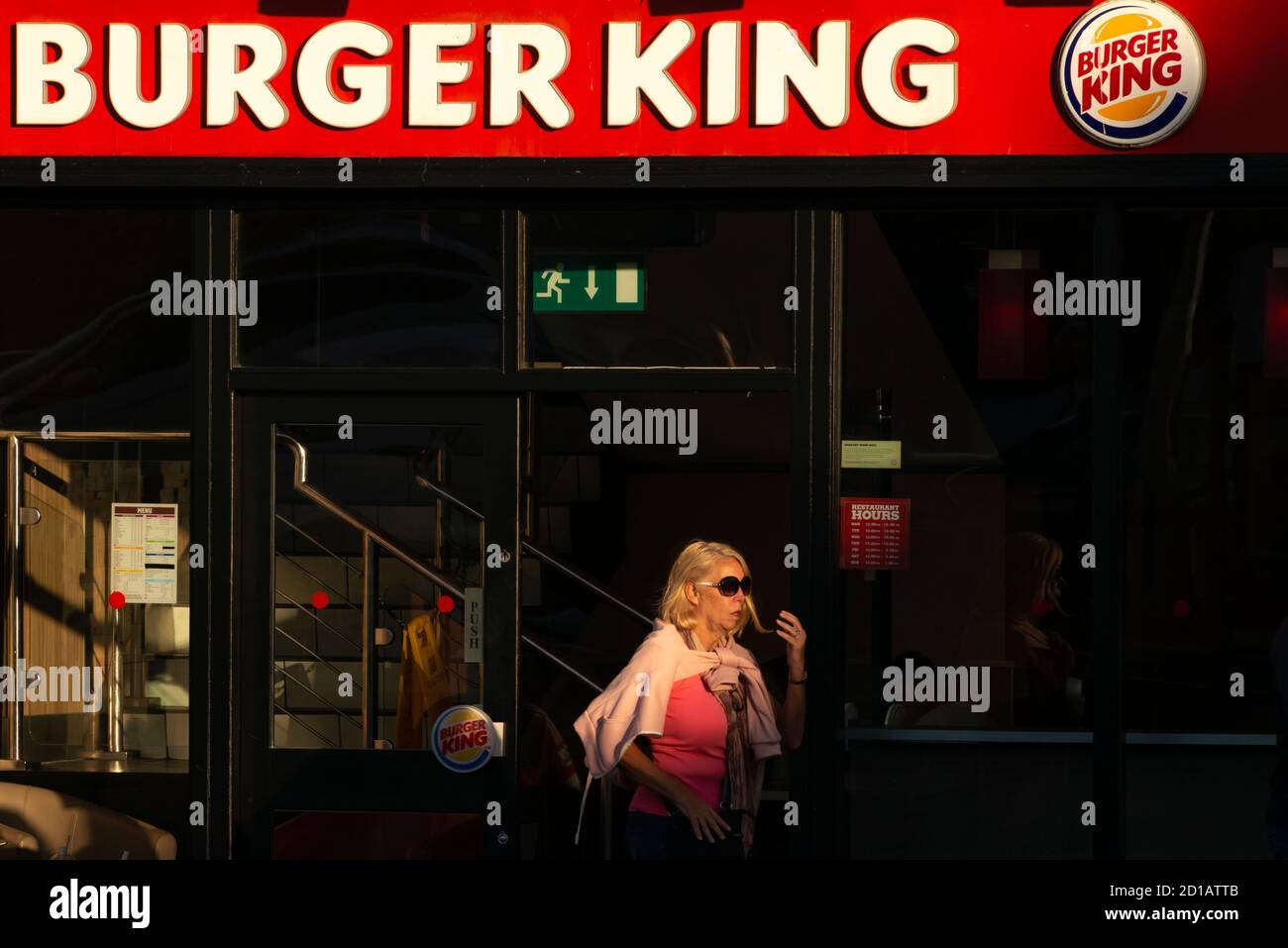 Strong light and shadows vibrant view of Burger King restaurant in