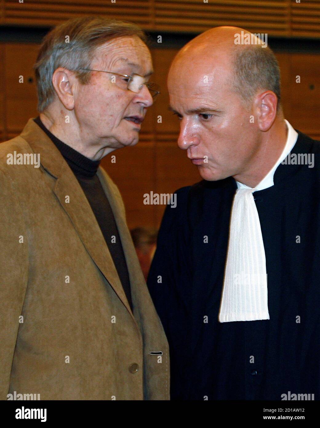 French former lawyer Jean-Maurice Agnelet (L) talks with his lawyer Francois  Saint-Pierre in a courthouse in Aix-en-Provence, south-eastern France at  the start of his trial in the court of appeals regarding the