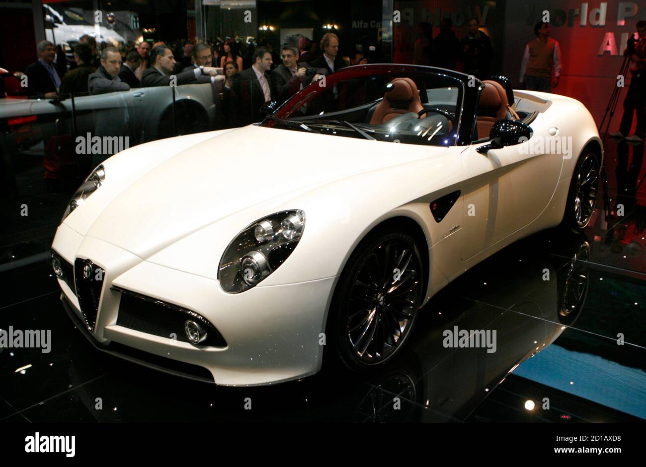 A Alfa Romeo 8C Cabrio is displayed during the first media day of the 78th  Geneva Car Show at the Palexpo in Geneva March 4, 2008. REUTERS/Denis  Balibouse (SWITZERLAND Stock Photo - Alamy