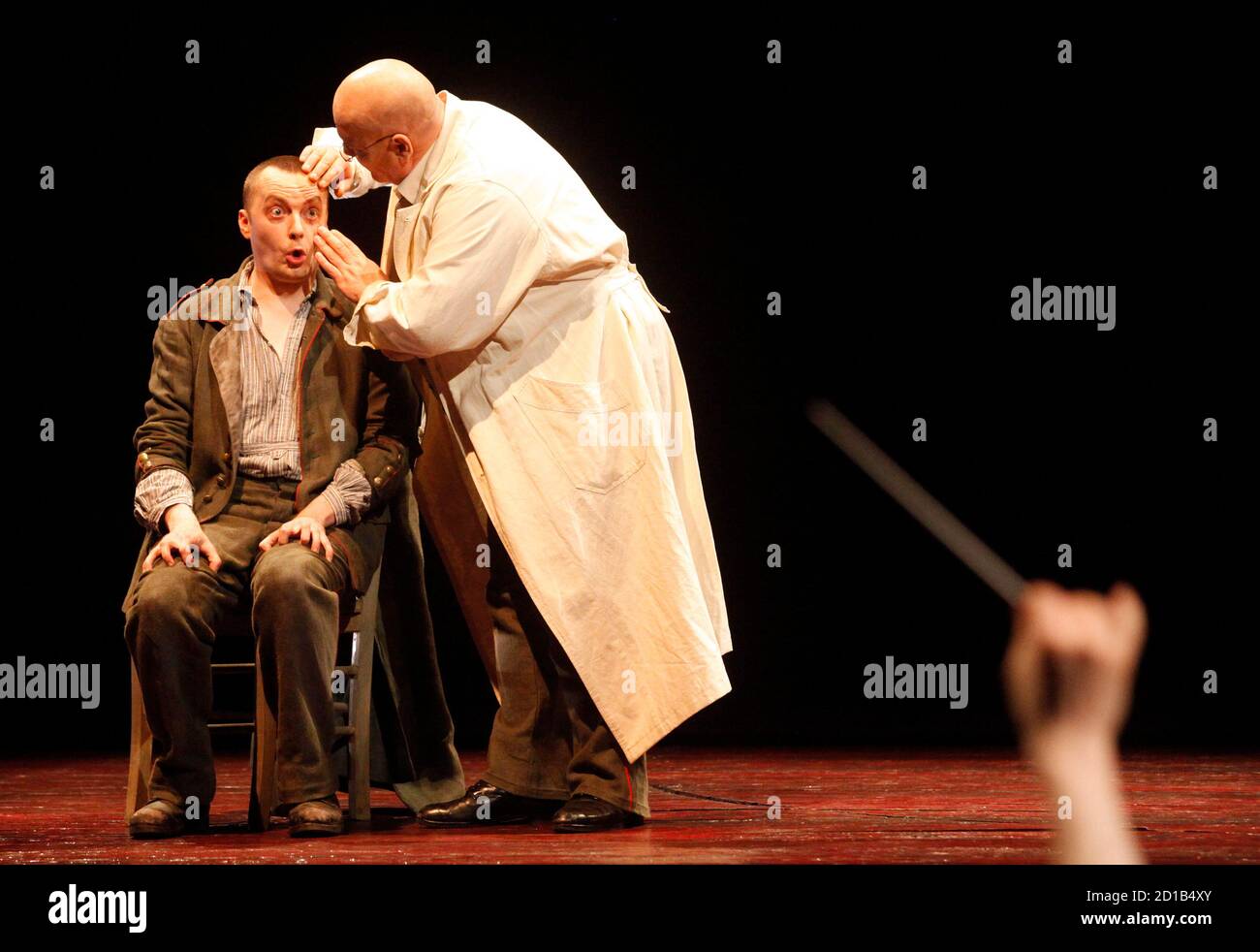Singers Georg Nigl and Wolfgang Bankl (R) perform as Wozzeck and Professor  during a dress rehearsal of Alban Berg's opera "Wozzeck" on stage at Vienna's  Theater an der Wien May 12, 2010.