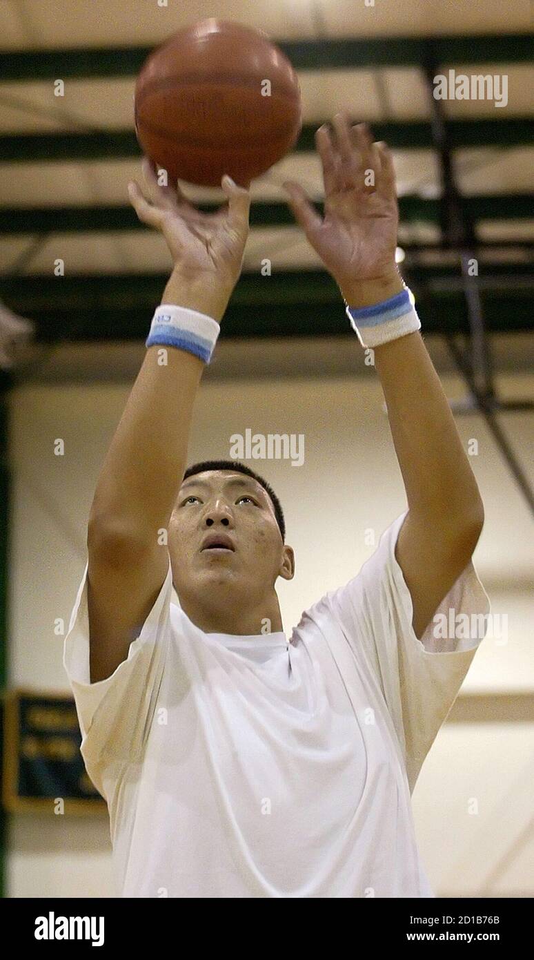 Sun Ming Ming of China, who plays for the United States Basketball League's  (USBL) Dodge City Legend, shoots the ball during a workout session in  Greensboro, North Carolina October 6, 2006. At