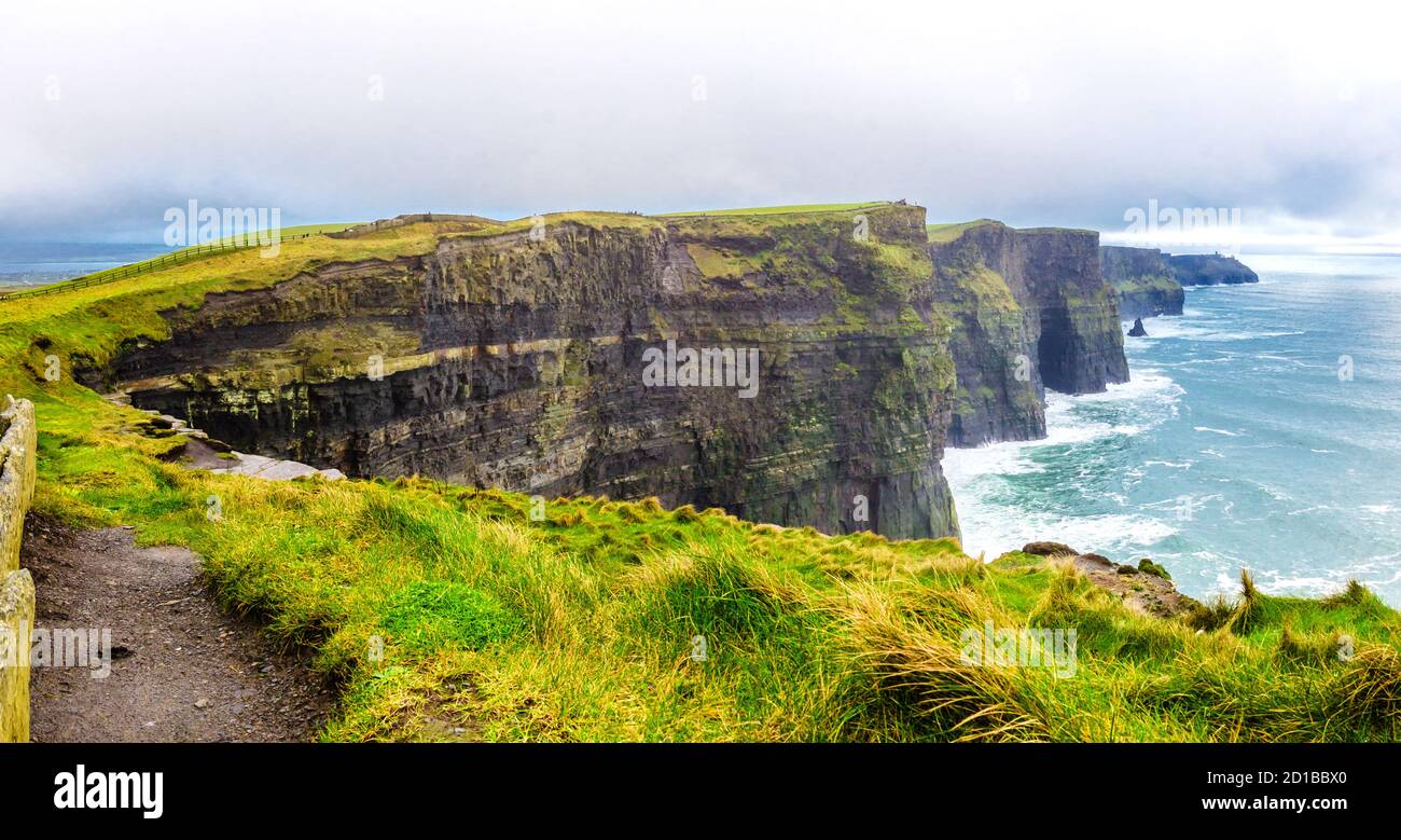 Panoramic view of the Cliff of Moher in a cloudy wintery day, Ireland Stock Photo