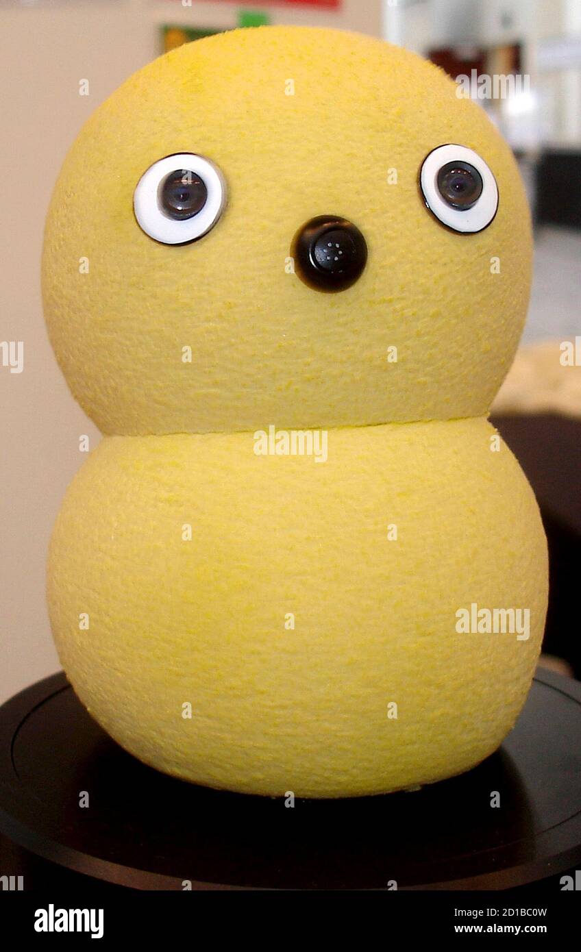 Keepon, a bright yellow, silicon-skinned, snowman-like robot sits on  display at the IEEE International Conference for Robotics and Automation in  Pasadena, California May 22, 2008. Keepon may not experience life in quite