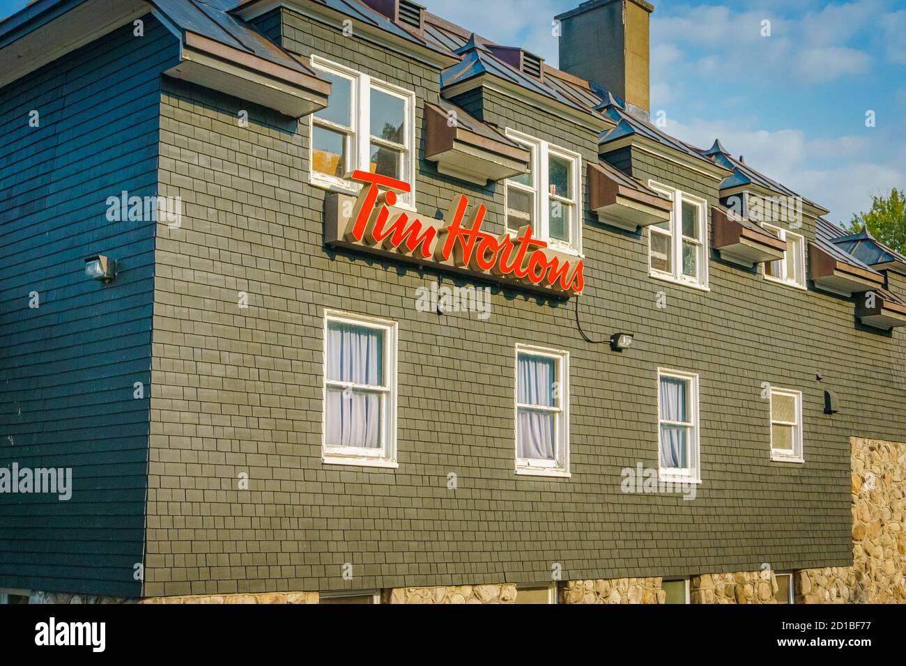 Niagara Falls, Canada, July 2015 - Back of an old building operating as a Tim Hortons restaurant  Stock Photo