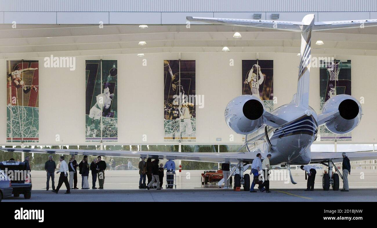 A Nike Inc. corporate jet sits in a hangar after landing successfully in  Hillsboro, Oregon November 21, 2005. The plane circled the Portland, Oregon  area for several hours because of a landing