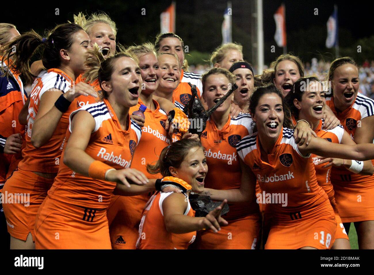 The Netherlands women field hockey team poses with the trophy after beating  Argentina 1-0 in their women's Champions Trophy final match in Quilmes, on  the outskirts of Buenos Aires, January 21, 2007.