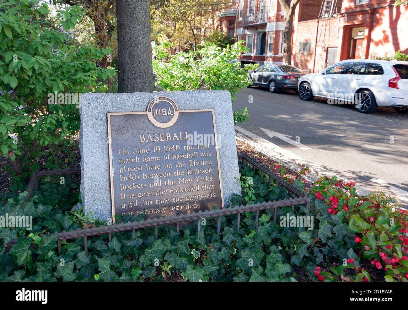 Bronze plaque in Hoboken, NJ marks the place where the first organized baseball game was played between the Knickerbockers & the New Yorks in 1846. Stock Photo