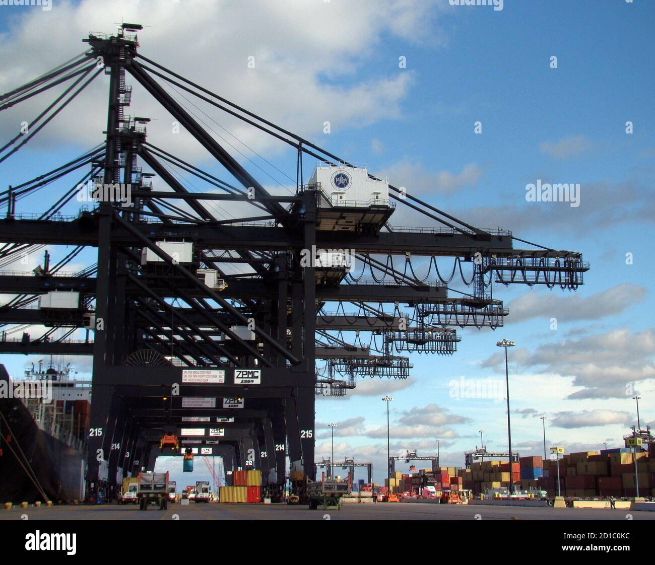 Giant cranes unload a container ship at the Barbours Cut Container Terminal  south of Houston, on December 3, 2009. The terminal is among several  operated by the Port of Houston Authority, which