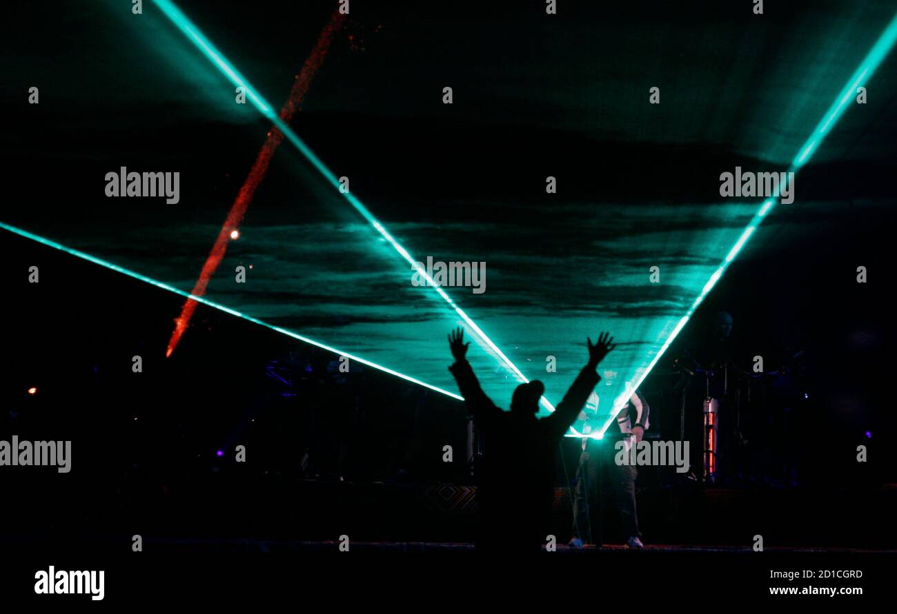 French musician Jean Michel Jarre performs during a concert in Merzouga,  Morocco, December 17, 2006. The concert was one of the highlights marking  the end of the United Nations International Year of