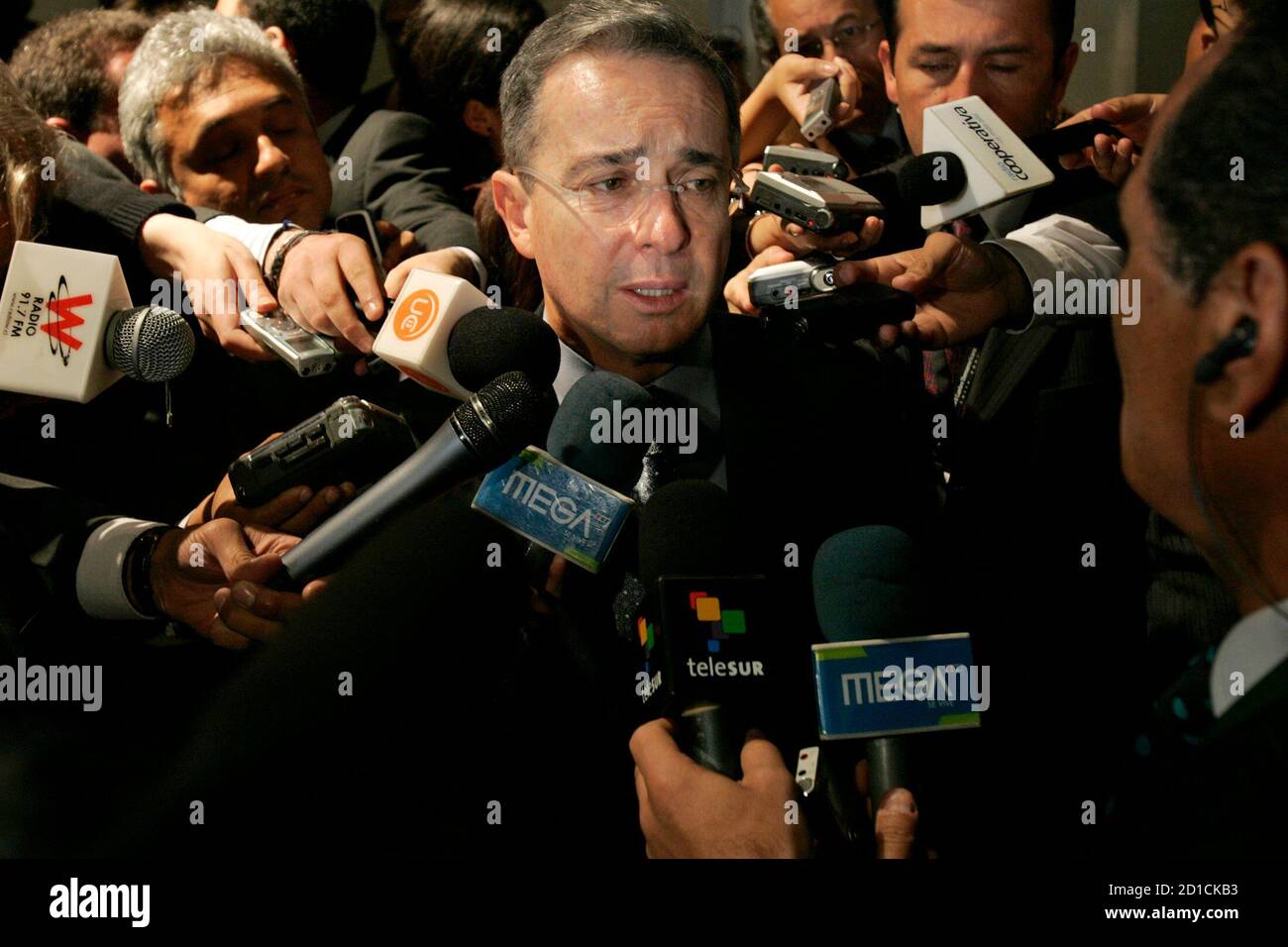 Colombia's President Alvaro Uribe talks to the media in Santiago November  9, 2007. Uribe is taking part in the XVII Iber-American summit where  leaders from around Latin America and from Portugal, Spain