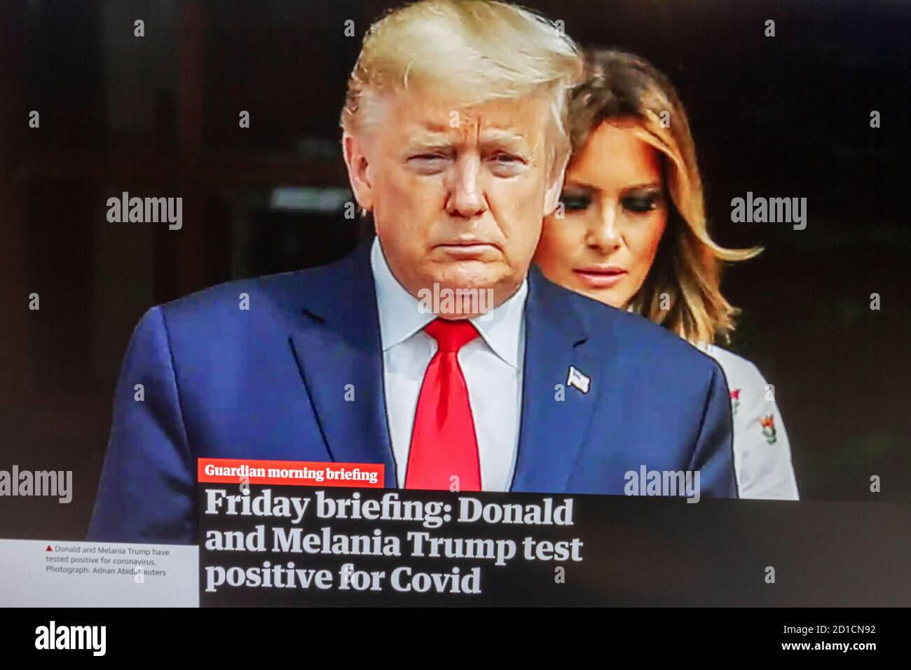 Screenshot of Guardian newspaper in the UK announcing that US President Donald Trump had tested positive for Covid-19 on 2nd October 2020. Stock Photo