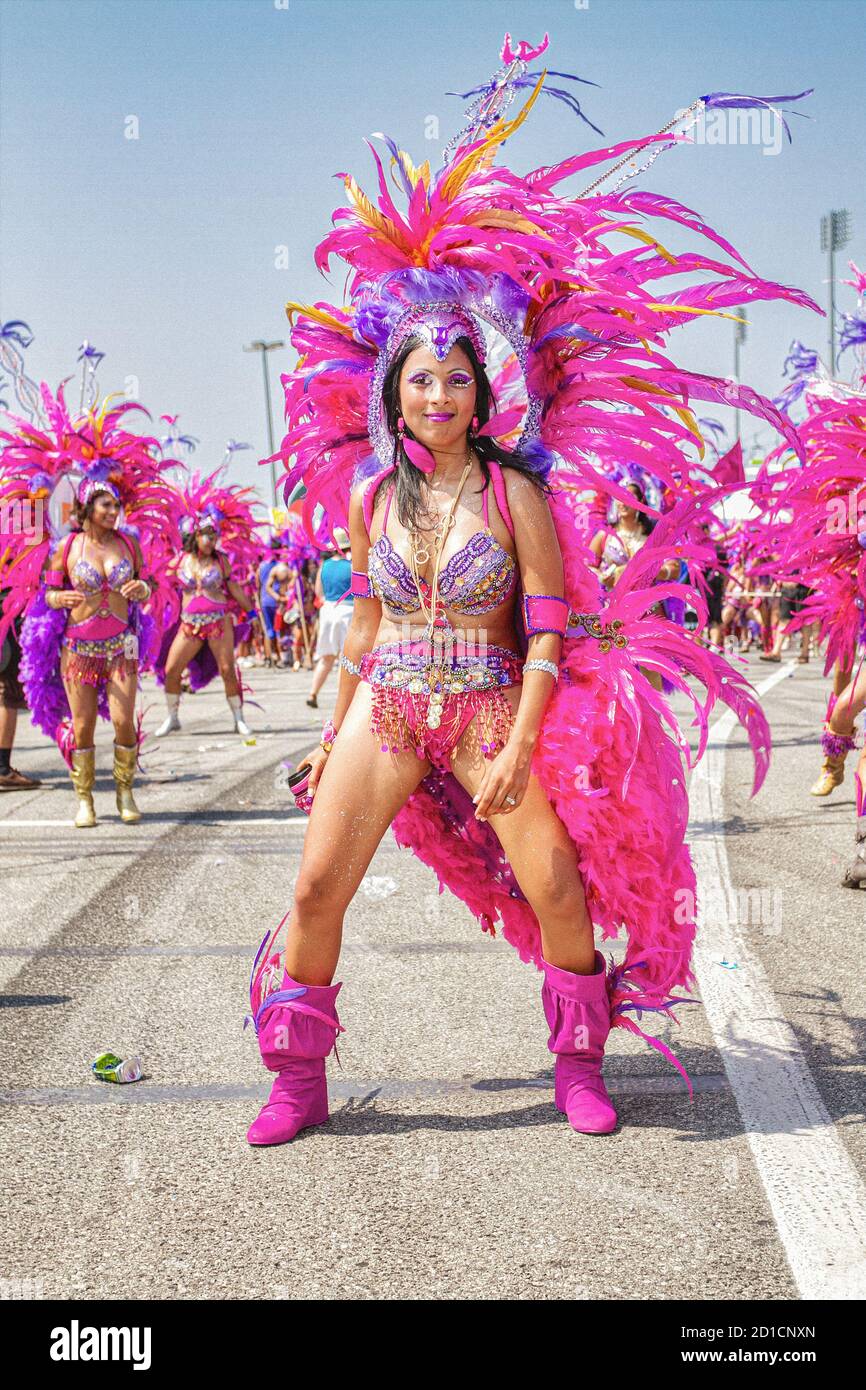 Portrait of a female masquerader wearing a colourful costume during The Scotiabank Toronto Caribbean Carnival 2012 parade. Stock Photo