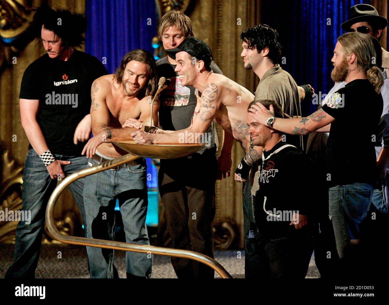 The cast members of the MTV series "Jackass" gather onstage to present the  Viewer's Choice award to Fall Out Boy at the 2006 MTV Video Music Awards in  New York August 31,