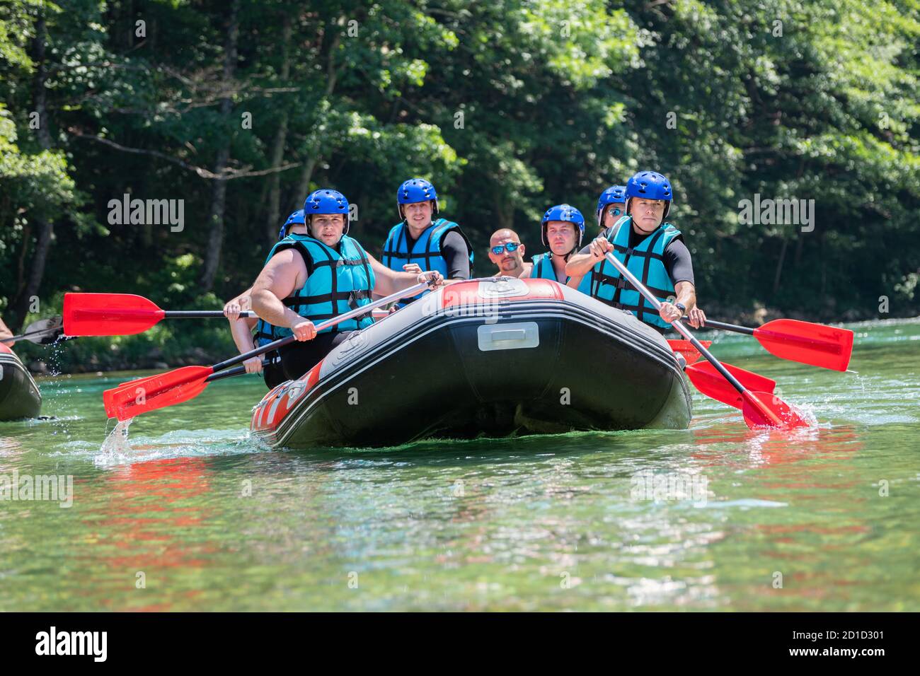 Rafting team goes down the river on the beautiful sunny day Stock Photo ...