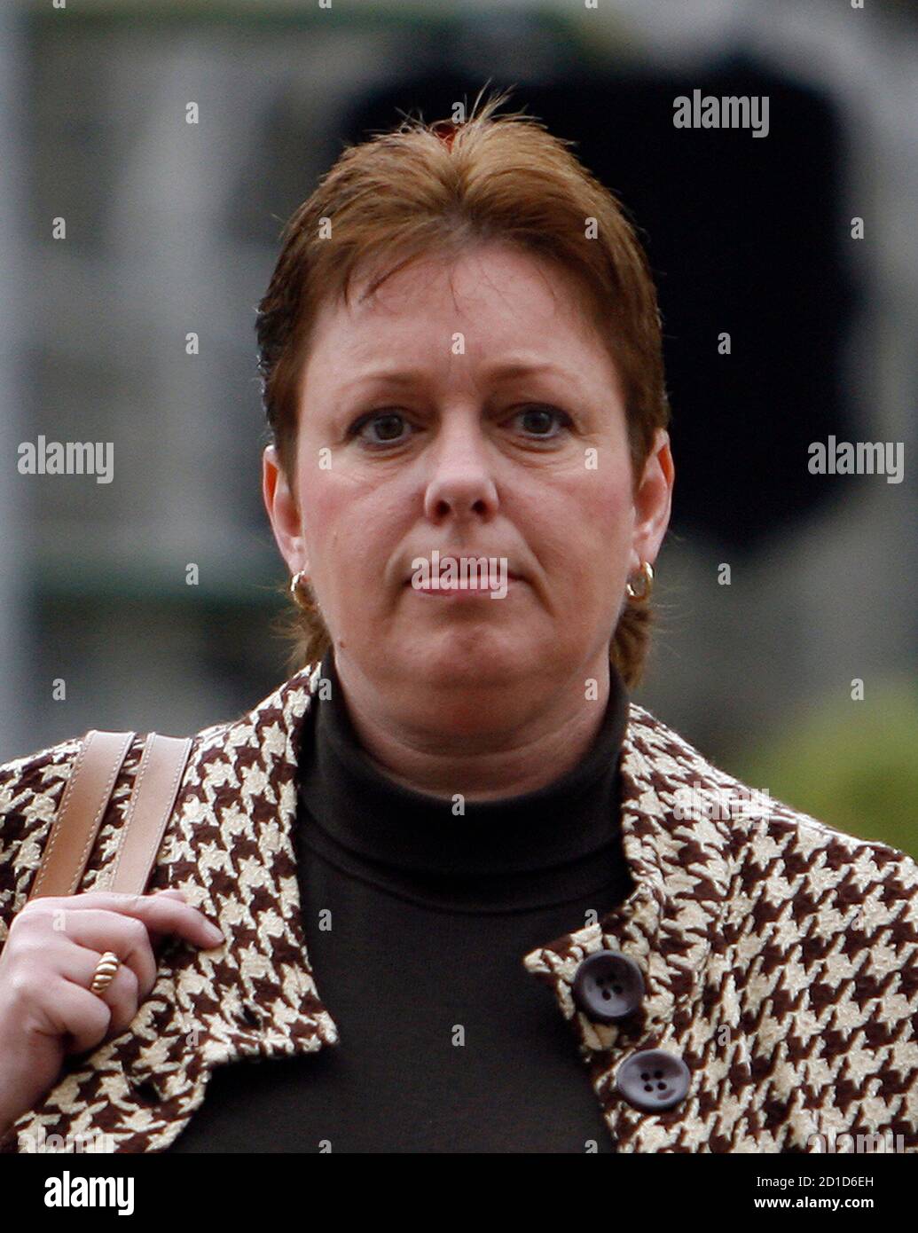 Lori Drew arrives at the U.S. District Court in Los Angeles November 26,  2008. Drew, a suburban mother who prosecutors say drove a love-struck  13-year-old Megan Meier to suicide by tormenting her