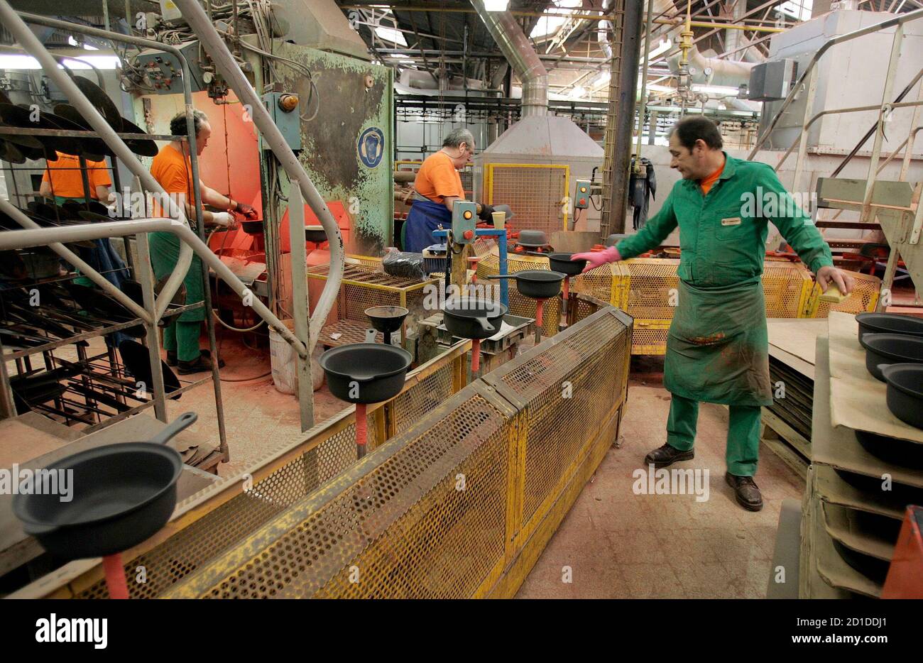 Employees work in Le Creuset kitchen utensils factory in Fresnoy le Grand,  central France, January 25 REUTERS/Regis Duvignau (FRANCE Stock Photo -  Alamy