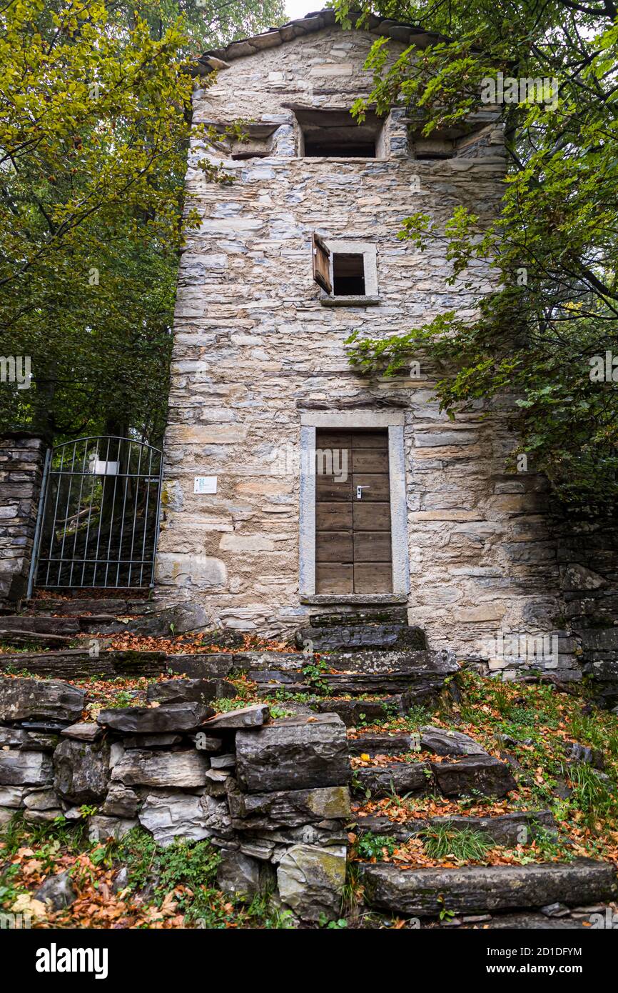 Hidden among the trees, at an altitude of 950 meters stands the Roccolo Meri, the bird tower of Scudellate. The tower has been restored and can also be visited at certain times. Roccolo in Scudelate, Ticino, Switzerland Stock Photo