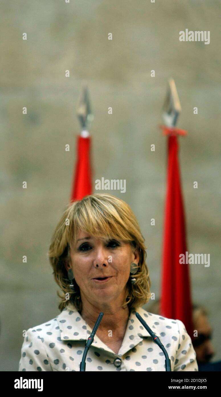 Esperanza Aguirre, Madrid regional president, speaks during a news conference in the regional headquarters of the Popular Party in central Madrid November 27, 2008. Aguirre explained how she escaped unhurt from the lobby of Mumbai's Trident-Oberoi hotel when Islamist militants fired automatic weapons indiscriminately and threw grenades before settling in for a long siege at the Taj and the Trident-Oberoi hotels. REUTERS/Sergio Perez (SPAIN) Stock Photo