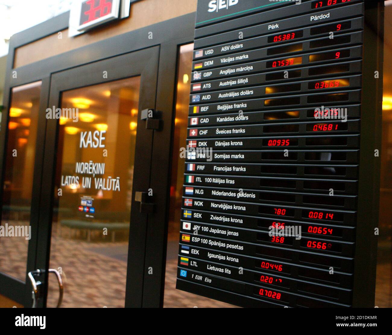 A Currency Exchange Board Is Seen At A Seb Bank Branch In Riga March 17,  2009. Latvian Monetary Financial Institutions Posted Losses Worth 5.7  Million Lats ($10.5 Million) In The First Two
