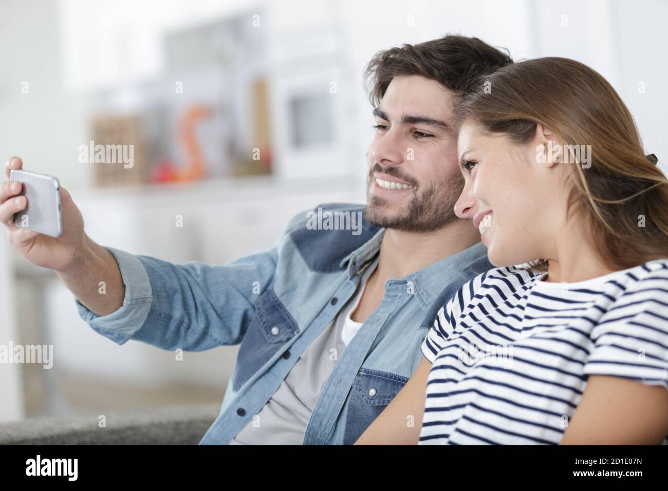 selfie taken by happy young couple at home Stock Photo - Alamy