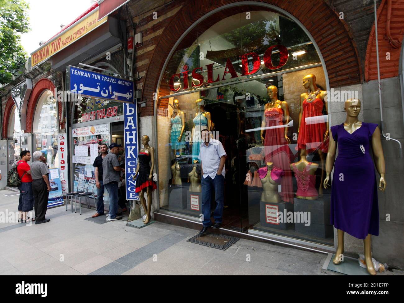 A Shopkeeper Waits For Customers Next To An Iranian Travel Agency In Istanbul June 24 2010