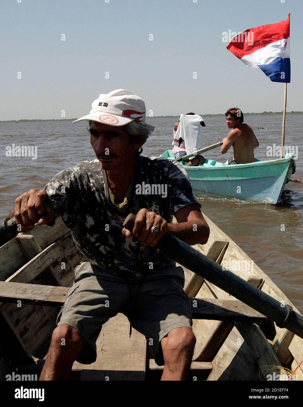 Fishermen block the Paraguay river in protest over the lack of payment of the annual subsidy that they receive from the government during the season when fishing is prohibited to protect the river stocks, in Asuncion November 21, 2008. Nearly 14,000 fishermen depend on the subside to survive during the off season from November 1 to December 20. REUTERS/Jorge Adorno (PARAGUAY) Stock Photo