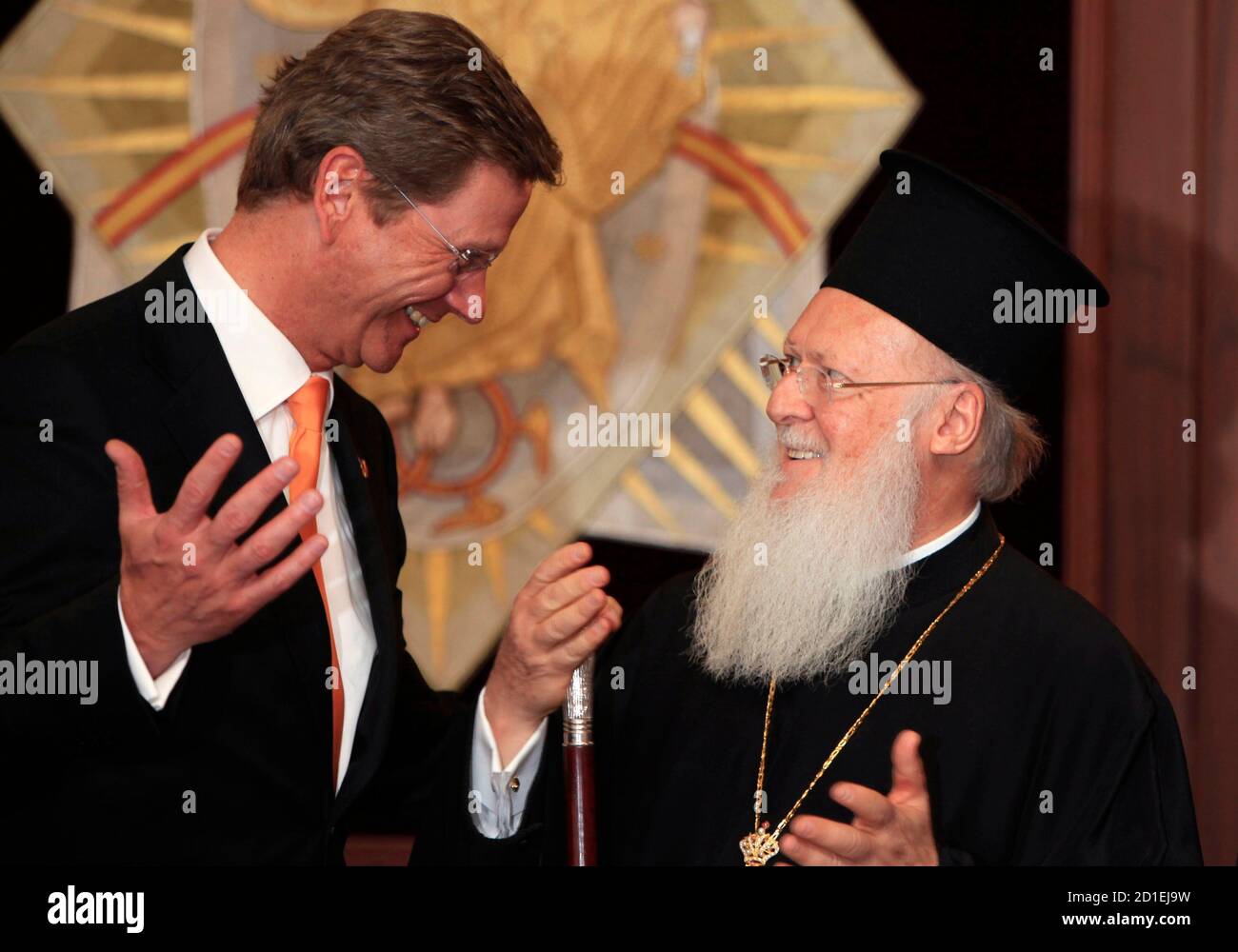 Germany's Foreign Minister Guido Westerwelle (L), leader of Germany's liberal party, the Free Democratic Party (FDP), chats with Ecumenical Orthodox Patriarch Bartholomew I at the Greek Orthodox Patriarchate in Istanbul January 8, 2010. REUTERS/Murad Sezer (TURKEY - Tags: POLITICS RELIGION SOCIETY) Stock Photo