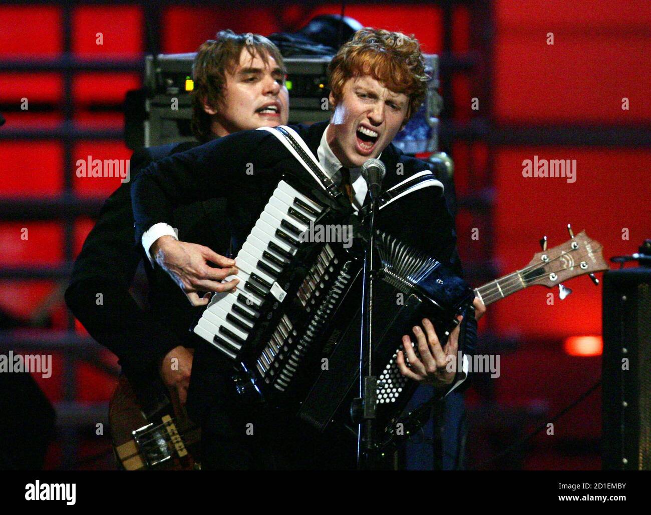 Members of the Canadian band Arcadia Fire perform during the Fashion Rocks concert at New York City's Radio City Music Hall, September 8, 2005. All proceeds from the concert were being donated to hurricaine Katrina relief by the Conde Naste Media Group. REUTERS/Mike Segar  MS/AT Stock Photo