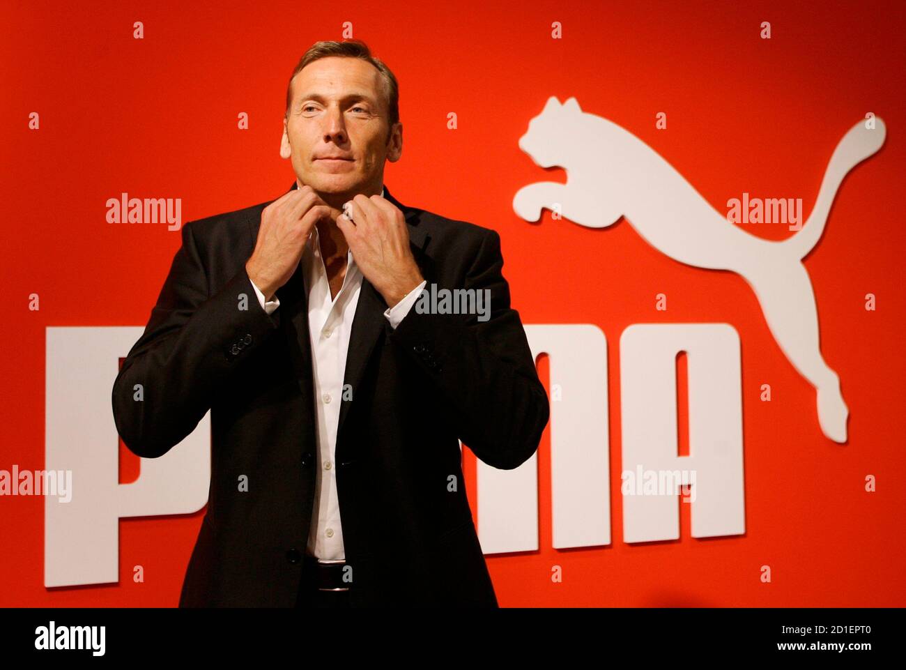 Jochen Zeitz, CEO of German sports goods firm Puma prepares himself before  a news conference with PPR in Nuremberg April 12, 2007. French retailer PPR  said it has not set a minimum