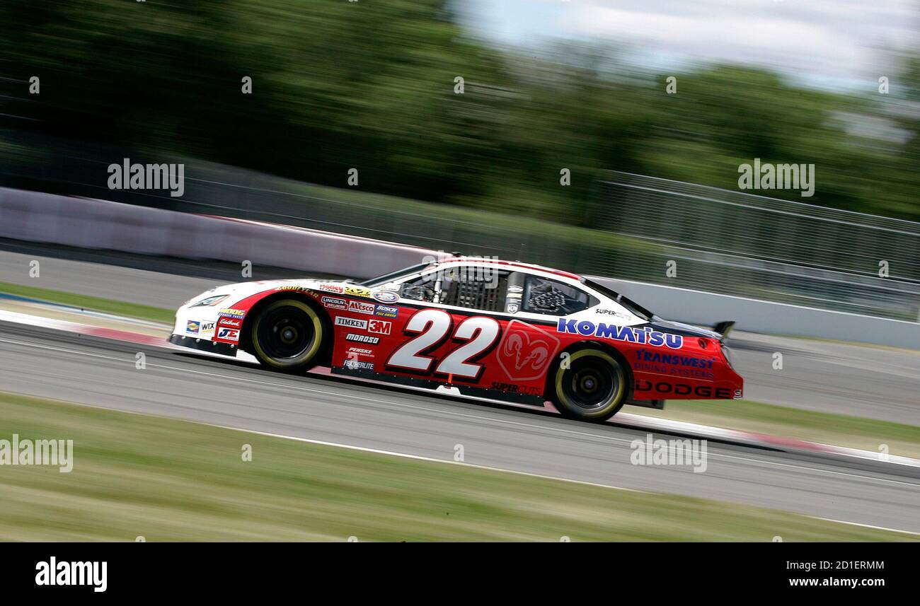 Patrick Carpentier Of Canada Races Through The Senna Corner As He Wins Pole Position In Qualifying