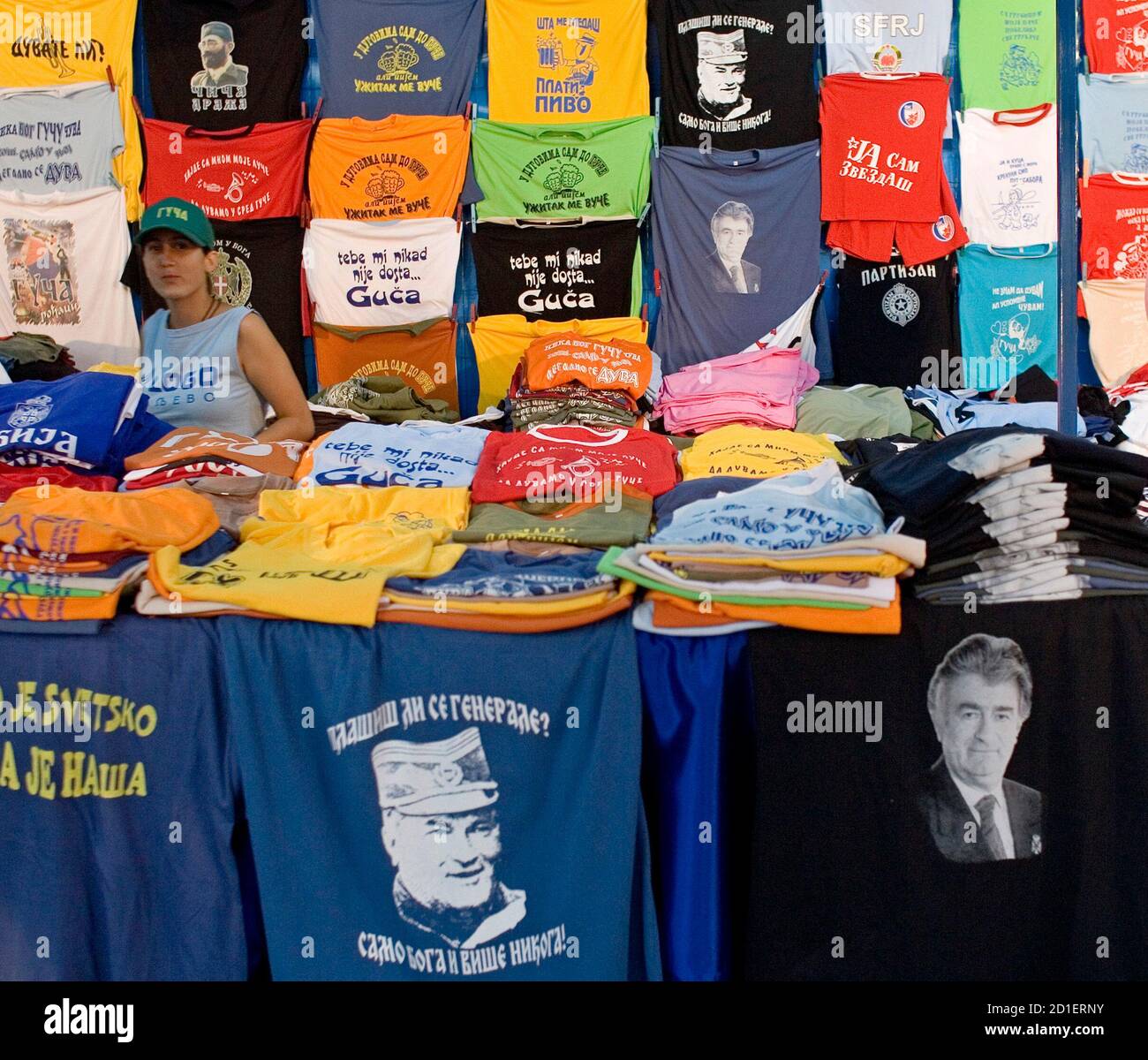 T-shirts with pictures of war crime fugitive General Ratko Mladic and  Bosnian Serb Radovan Karadzic are sold at the 47th annual brass band  festival in the Serbian village of Guca, some 160