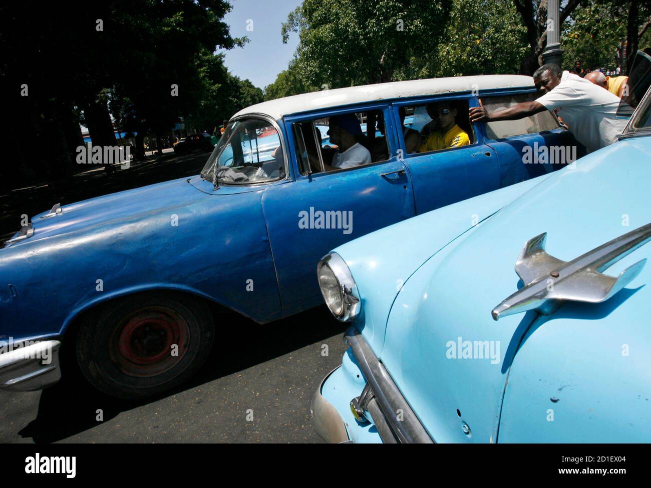 Men Push A Vintage Car Used As A Taxi In Havana April 26 2008 Cubans On Both Sides Of The Florida Straits Share A Love For Vintage American Cars In Miami Members