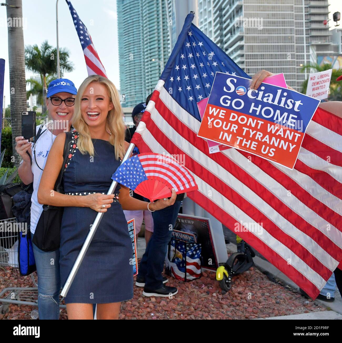 MIAMI, FLORIDA - JUNE 26: (EXCLUSIVE COVERAGE) President Trumps Newly appointed White House Press Secretary Kayleigh McEnany joins Protesters outside prior to the first 2020 Democratic presidential debate including New York police officers that are protesting New York Mayor Bill de Blasio. A field of 20 Democratic presidential candidates was split into two groups of 10 for the first debate of the 2020 election, taking place over two nights at Knight Concert Hall of the Adrienne Arsht Center for the Performing Arts of Miami-Dade County on June 26, 2019 in Miami, Florida Credit: Hoo-me/MediaPu Stock Photo