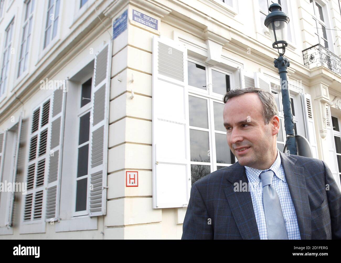 Belgium's Enterprises Federation VBO-FEB Chairman Thomas Leysen leaves Belgium's Prime Minister Yves Leterme's office after a meeting in Brussels February 8, 2010. Belgian government met with unions on employment.    REUTERS/Yves Herman    (BELGIUM - Tags: POLITICS EMPLOYMENT BUSINESS) Stock Photo