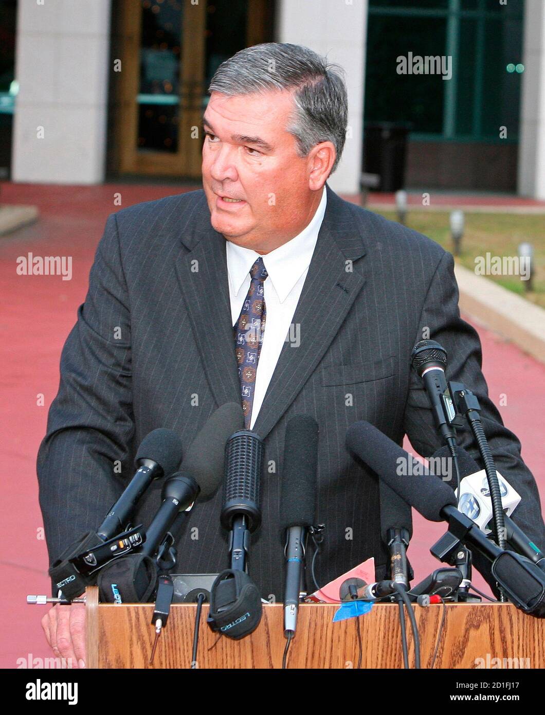 State Attorney Mark Ober, appointed by Florida Governor Jeb Bush to prosecute the Martin Lee Anderson case, speaks to reporters in front of the Leon County Florida Courthouse November 28, 2006 after charges were filed against seven guards and one nurse in Bay County Florida for the aggravated manslaughter of 14 year-old Martin Lee Anderson at the Bay County Florida juvenile boot camp in January 2006.  REUTERS/Mark Wallheiser (UNITED STATES) Stock Photo