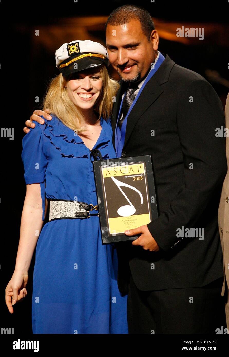 Co-writers Natasha Bedingfield (L) and Wayne Rodrigues pose after receiving a pop award for the song 'Unwritten' during the 25th Annual ASCAP Pop Music Awards at the Kodak theatre in Hollywood, California, April 9, 2008. REUTERS/Danny Moloshok (UNITED STATES) Stock Photo