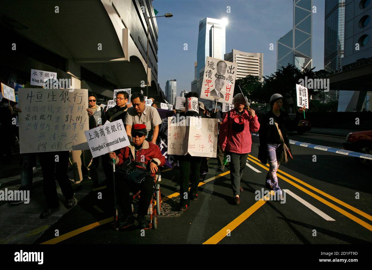 Protesters Demonstrate In Hong Kong March 15 2009 Demanding A Refund Of Their Lehman Brothers Minibonds Which They Bought At Various Banks In The Territory Reeling From Hefty Monetary Losses And Sudden