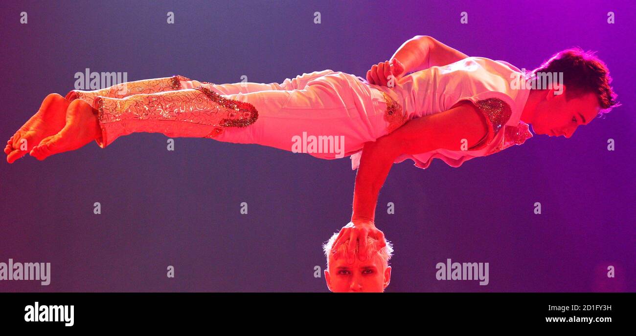 Artists from the Circus Theater Bingo perform during the rehearsal of a new  show by Swiss National-Circus Knie in the town of Rapperswil east of Zurich  March 26, 2010. Circus Knie starts