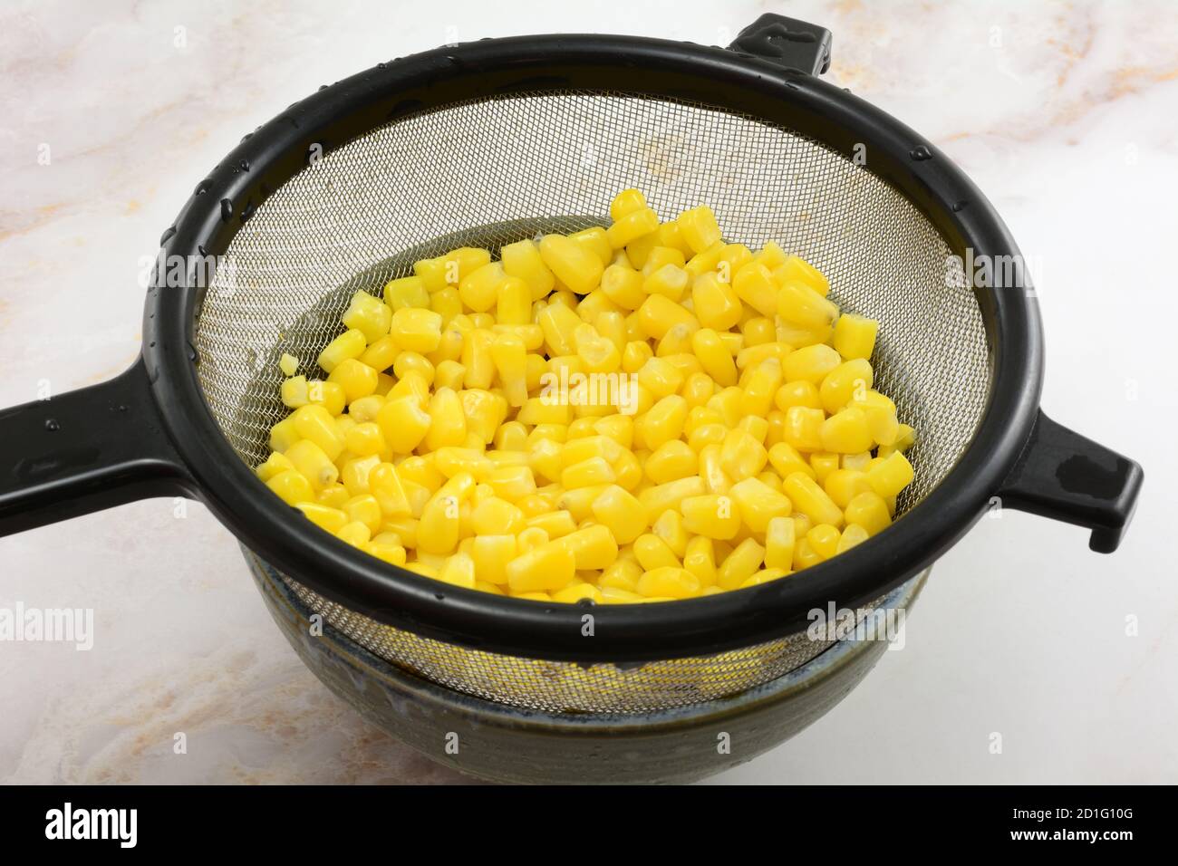 Metal strainer hi-res stock photography and images - Alamy