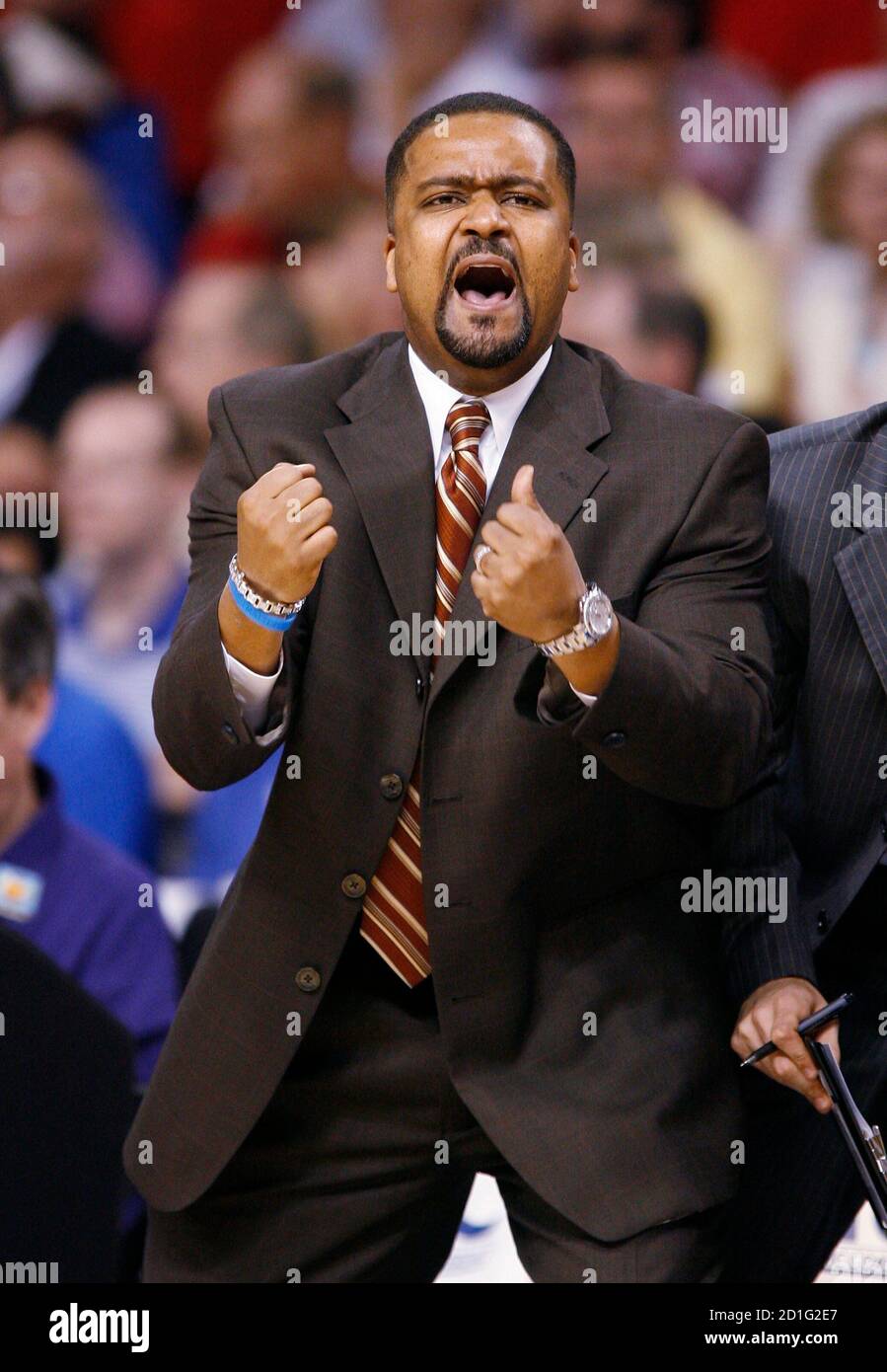 Miami head coach Frank Haith shouts to his team as they play Maryland  during the first half of the first round of the ACC college basketball  championship in Tampa, Florida March 8,