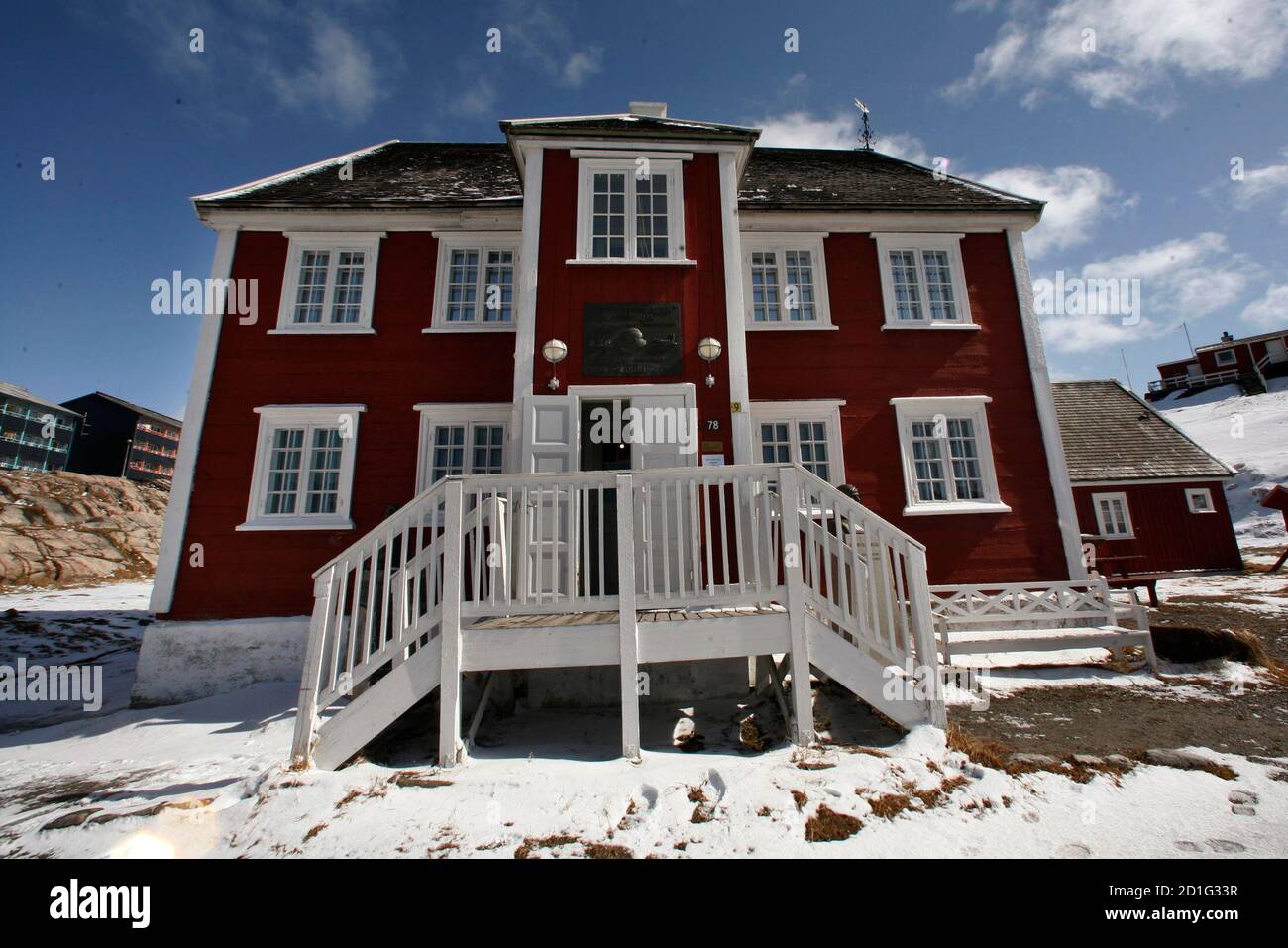 The house and museum of arctic explorer Knud Rasmussen stands near the center of Ilulissat as seen in this photo taken May 20, 2007. REUTERS/Bob Strong (GREENLAND) Stock Photo
