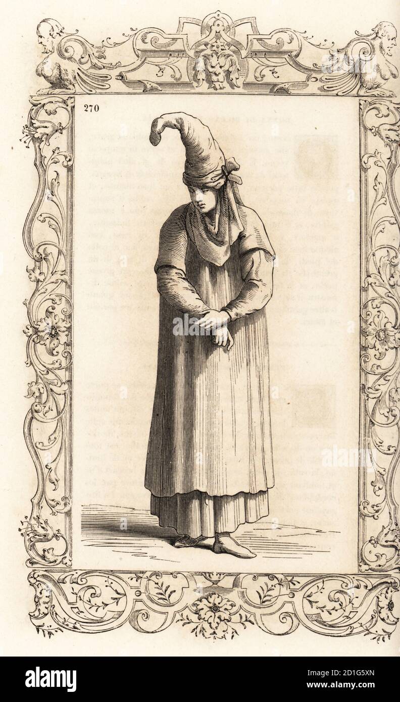 Costume of a woman of Biscay, Basque Country, Spain, 16th century. She wears a tall conical hat formed of a rolled veil, and a moire silk cloth covers her neck. Costume de femme de Biscaye. Within a decorative frame engraved by H. Catenacci and Fellmann. Woodblock engraving by Gerard Seguin and E.F. Huyot after a woodcut by Christoph Krieger from Cesare Vecellio’s 16th century Costumes anciens et modernes, Habiti antichi et moderni di tutto il mondo, Firman Didot Ferris Fils, Paris, 1859-1860. Stock Photo