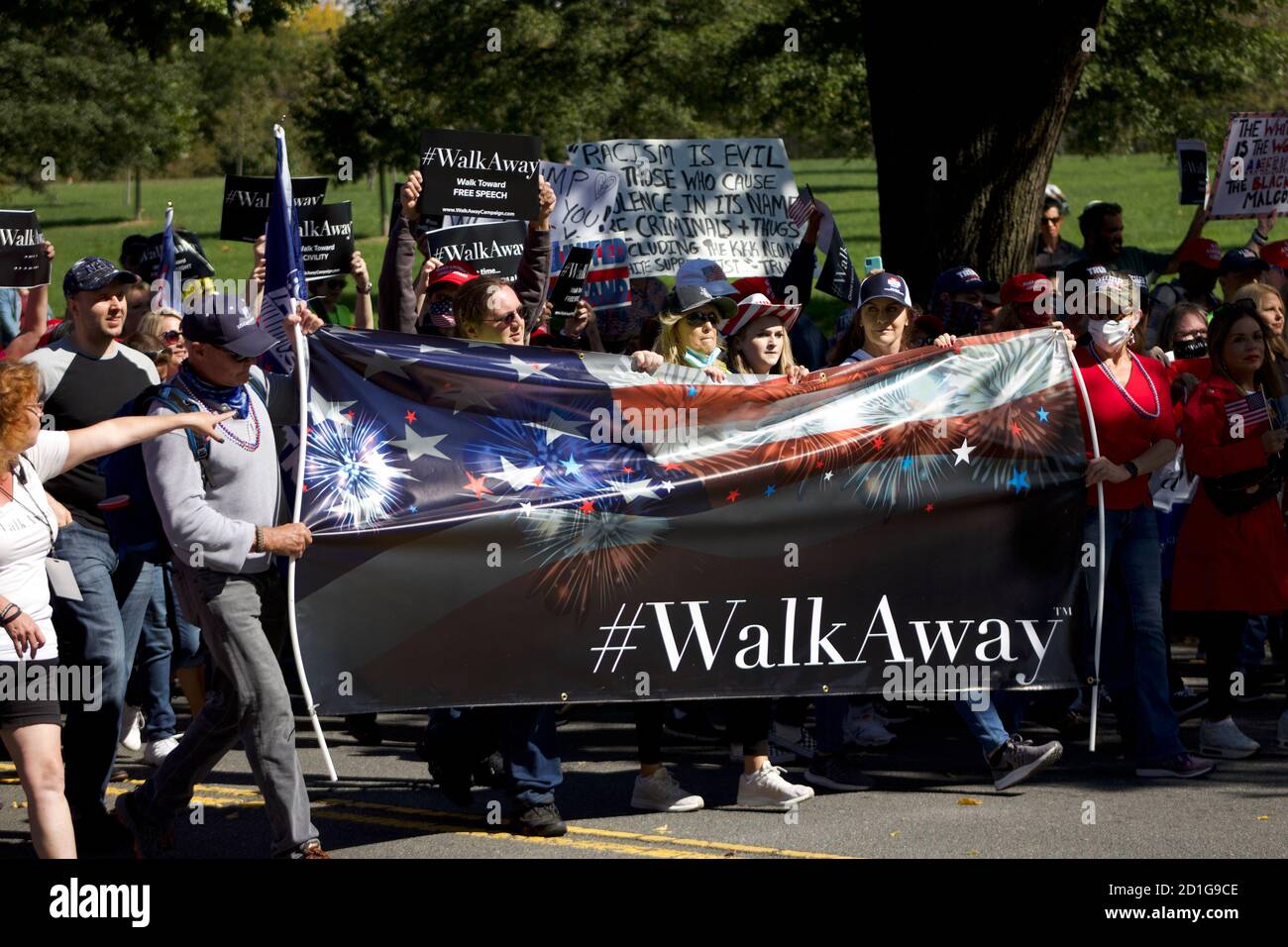 Marchers carry a banner down Constitution Ave NW during the #WalkAway Campaign's Unsilent Majority March (October 3rd 2020) Stock Photo