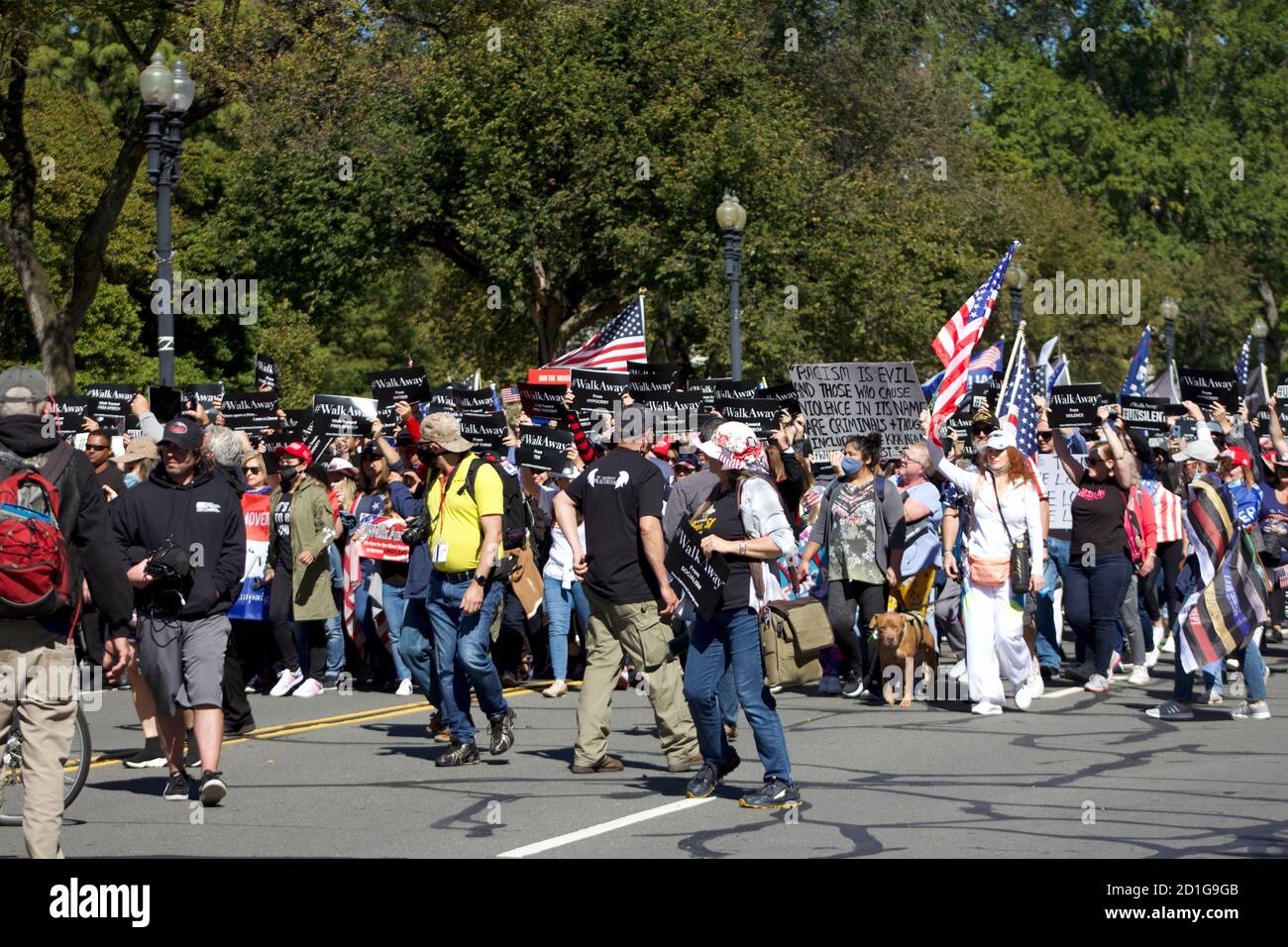 Marchers walk down 15th Street NW during the #WalkAway Campaign's Unsilent Majority March on Washington (October 3rd 2020) Stock Photo
