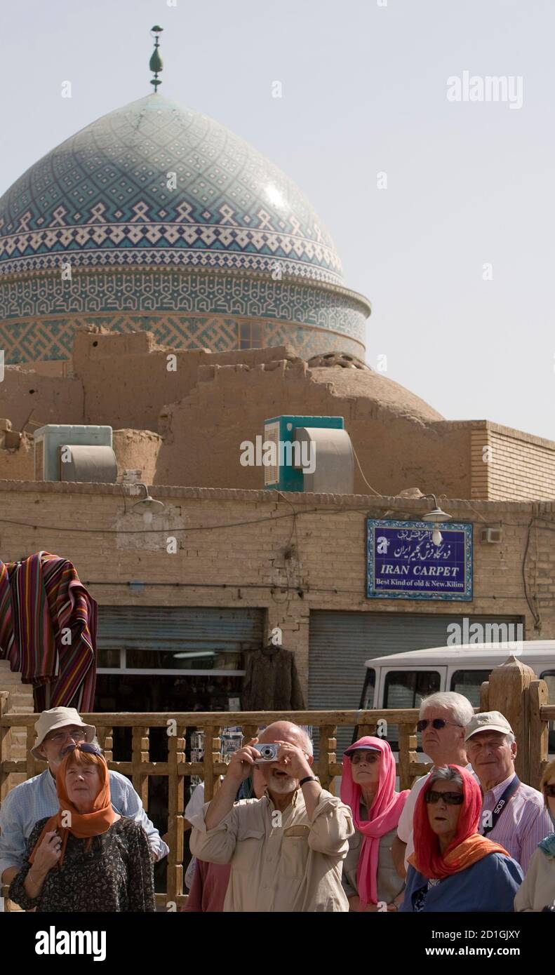 Tourists Take Pictures Of The Grand Mosque In Yazd 700 Km 435 Miles South Of Tehran October 15 08 As Some Western Corporations Pack Up And Mothball Projects In Iran Under Pressure